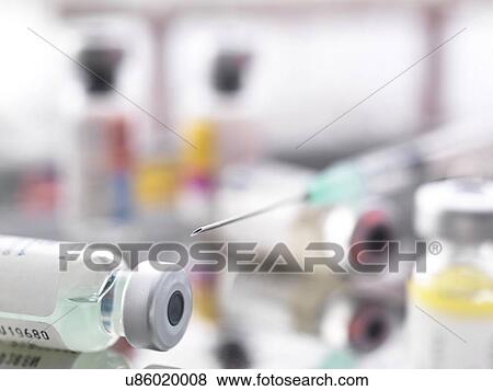 Stock Photo - Syringe and vials. Fotosearch