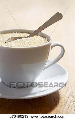 Tea cup full of sugar View Large Photo Image Stock Photo - Tea cup full of sugar. Fotosearch