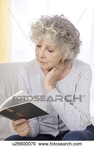 Woman reading book View Large Photo Image Stock Image - Woman reading book. Fotosearch