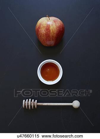 Apple honey and honey dripper View Large Photo Image Stock Photography - Apple honey and honey dripper. Fotosearch