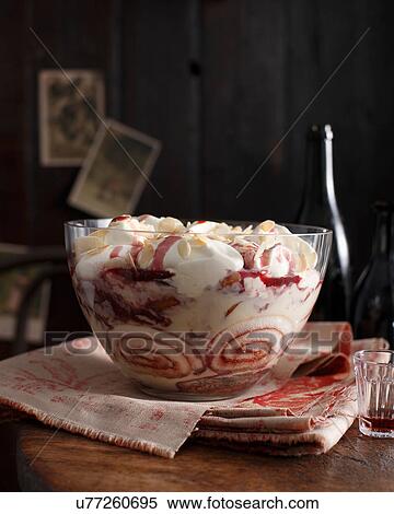 Stock Photography - Bistro dessert of port wine trifle on table. Fotosearch