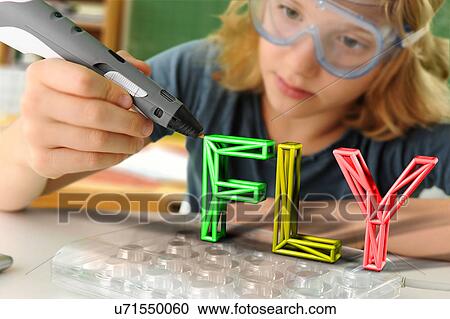 Stock Image - Boy with digital pen and 3D model of capital-lettered word in classroom. Fotosearch