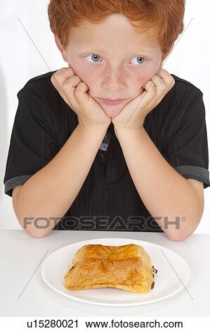 Boy with plate of food View Large Photo Image Stock Image - Boy with plate of food. Fotosearch