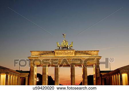 Stock Image - Brandenburg gate illuminated at sunset, Berlin, Germany. Fotosearch