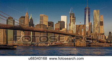 Brooklyn Bridge and Manhattan Skyline, NY, NY at Sunrise View Large Photo Image Stock Photo - Brooklyn Bridge and Manhattan Skyline, NY, NY at Sunrise. Fotosearch