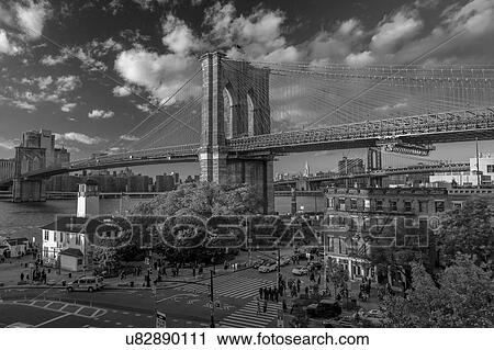Stock Image - Brooklyn Bridge at sunset, NY NY - in black and white. Fotosearch