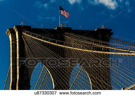 Stock Photo - Brooklyn Bridge at sunset, NY NY - in black and white. Fotosearch