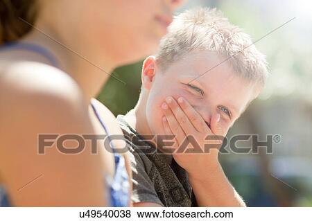 Brother and sister laughing together View Large Photo Image Stock Photo - Brother and sister laughing together. Fotosearch