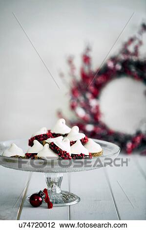 Christmas decorations and meringues on cake stand View Large Photo Image Stock Image - Christmas decorations and meringues on cake stand. Fotosearch