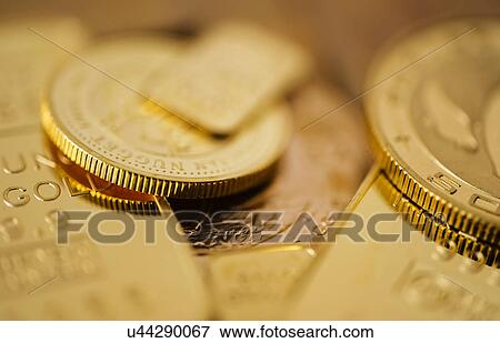 Close-up of gold coins View Large Photo Image Stock Photo - Close-up of gold coins. Fotosearch