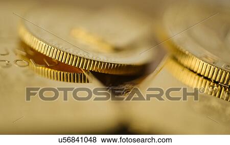 Stock Photo - Close-up of gold coins. Fotosearch