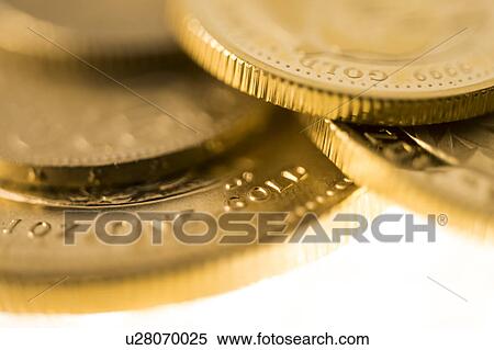 Close-up of gold coins View Large Photo Image Stock Photography - Close-up of gold coins. Fotosearch