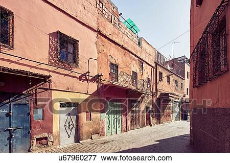 Cobbled street and traditional buildings, Marrakech, Morocco View Large Photo Image Stock Photo - Cobbled street and traditional buildings, Marrakech, Morocco. Fotosearch