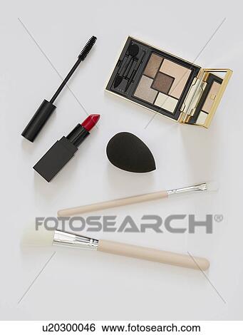 Stock Photograph - Cosmetics against white background. Fotosearch