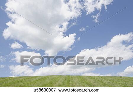 Cumulus clouds over hill View Large Photo Image Stock Photo - Cumulus clouds over hill. Fotosearch