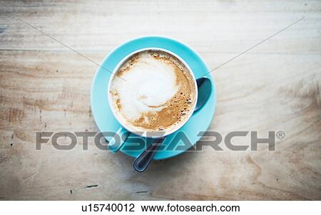 Cup of tea on table, overhead view View Large Photo Image Stock Image - Cup of tea on table, overhead view. Fotosearch
