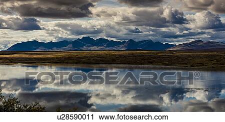 Stock Image - Denali Highway, Route 8, offers views of Mt. Deborah, Mnt. Hess Mountain, & Mt. Hayes Alaska, Alaska. Fotosearch