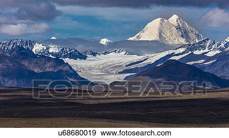 Stock Photo - Denali Highway, Route 8, offers views of Mt. Deborah, Mnt. Hess Mountain, & Mt. Hayes Alaska, Alaska. Fotosearch