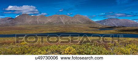 Stock Photograph - Denali Highway, Route 8, offers views of Mt. Deborah, Mnt. Hess Mountain, & Mt. Hayes Alaska, Alaska. Fotosearch