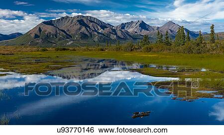 Stock Photograph - Denali Highway, Route 8, offers views of Mt. Deborah, Mnt. Hess Mountain, & Mt. Hayes Alaska, Alaska. Fotosearch