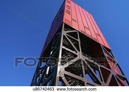 Drilling rig against a blue sky, low angle View Large Photo Image Stock Image - Drilling rig against a blue sky, low angle. Fotosearch