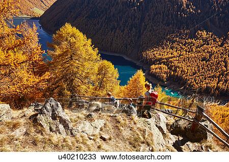Family hiking along ridge, high angle view, Schnalstal, South Tyrol, Italy View Large Photo Image Stock Image - Family hiking along ridge, high angle view, Schnalstal, South Tyrol, Italy. Fotosearch