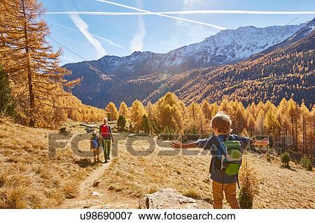 Family hiking, rear view, Schnalstal, South Tyrol, Italy View Large Photo Image Stock Photo - Family hiking, rear view, Schnalstal, South Tyrol, Italy. Fotosearch