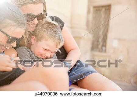 Family hugging and tickling, Lecce, Italy View Large Photo Image Stock Photograph - Family hugging and tickling, Lecce, Italy. Fotosearch