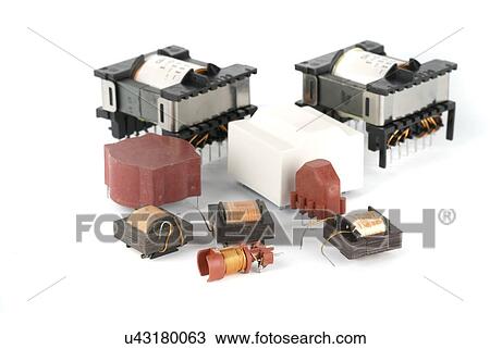Stock Image - Ferrite electronic transformers. Fotosearch
