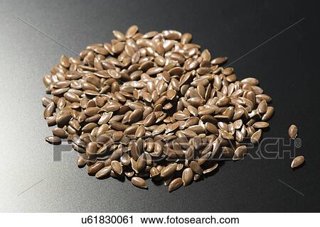 Stock Image - Flax seeds. Fotosearch
