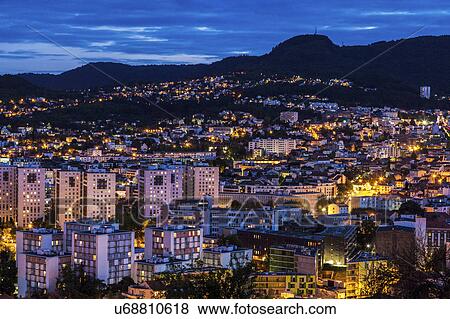 France, Auvergne-Rhone-Alpes, Clermont-Ferrand, Cityscape at dusk View Large Photo Image Stock Photo - France, Auvergne-Rhone-Alpes, Clermont-Ferrand, Cityscape at dusk. Fotosearch
