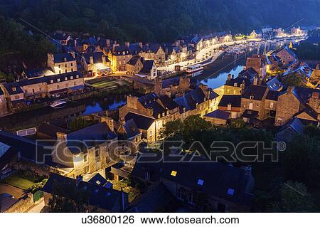 France, Brittany, Dinan, Cityscape with river at dusk View Large Photo Image Stock Photograph - France, Brittany, Dinan, Cityscape with river at dusk. Fotosearch
