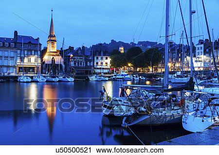 France, Normandy, Honfleur, Boats in harbor and Saint-Etiennei Church in distance View Large Photo Image Stock Image - France, Normandy, Honfleur, Boats in harbor and Saint-Etiennei Church in distance. Fotosearch