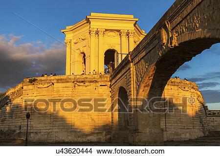 Picture - France, Occitanie, Montpellier, Pavillon du Peyrou at sunset. Fotosearch