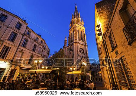 France, Occitanie, Montpellier, Sidewalk cafe and St. Anne Church at dusk View Large Photo Image Stock Photograph - France, Occitanie, Montpellier, Sidewalk cafe and St. Anne Church at dusk. Fotosearch