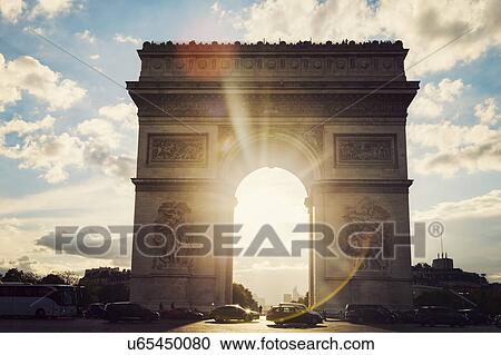 Stock Image - France, Paris, Arc de Triomphe at sunrise. Fotosearch