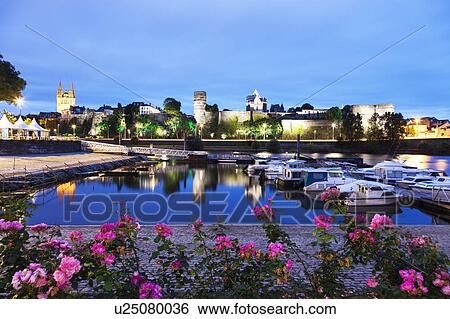 France, Pays de la Loire, Angers, Harbor by Chateau d'Angers at dusk View Large Photo Image Stock Photograph - France, Pays de la Loire, Angers, Harbor by Chateau d'Angers at dusk. Fotosearch