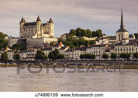 France, Pays de la Loire, Saumur, City waterfront at sunset View Large Photo Image Stock Photo - France, Pays de la Loire, Saumur, City waterfront at sunset. Fotosearch
