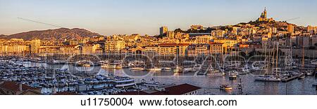 France, Provence-Alpes-Cote d'Azur, Marseille, Notre-Dame de la Garde above Vieux port - Old Port View Large Photo Image Picture - France, Provence-Alpes-Cote d'Azur, Marseille, Notre-Dame de la Garde above Vieux port - Old Port. Fotosearch