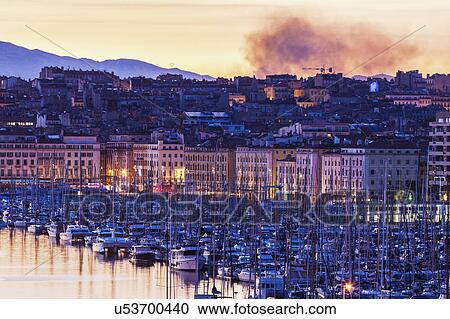 France, Provence-Alpes-Cote d'Azur, Marseille, Cityscape with Vieux port - Old Port at sunset View Large Photo Image Stock Image - France, Provence-Alpes-Cote d'Azur, Marseille, Cityscape with Vieux port - Old Port at sunset. Fotosearch