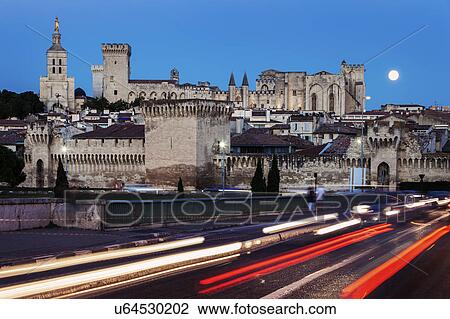 Stock Image - France, Provence-Alpes-Cote d'Azur, Avignon, Old town, street in foreground. Fotosearch