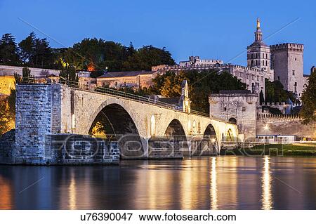 France, Provence-Alpes-Cote d'Azur, Avignon, Pont Saint-Benezet on Rhone River and Avignon Cathedral at dusk View Large Photo Image Stock Photo - France, Provence-Alpes-Cote d'Azur, Avignon, Pont Saint-Benezet on Rhone River and Avignon Cathedral at dusk. Fotosearch