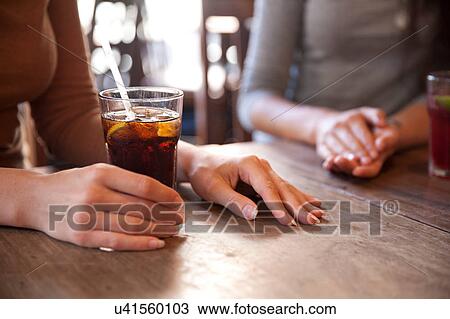 Friends enjoying drinks in pub, London View Large Photo Image Stock Image - Friends enjoying drinks in pub, London. Fotosearch
