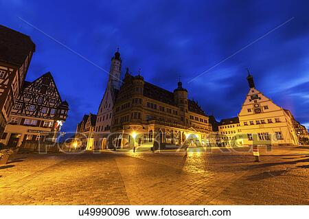 Stock Photograph - Germany, Bavaria, Rothenburg, Market Square at dusk. Fotosearch