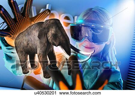 Girl in virtual reality headset interacting with digital floating elephant View Large Photo Image Stock Image - Girl in virtual reality headset interacting with digital floating elephant. Fotosearch