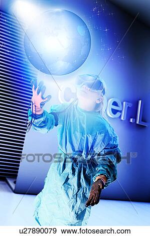 Girl in virtual reality headset interacting with digital floating planet earth View Large Photo Image Stock Photo - Girl in virtual reality headset interacting with digital floating planet earth. Fotosearch
