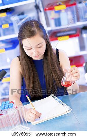 Girl making notes View Large Photo Image Stock Image - Girl making notes. Fotosearch