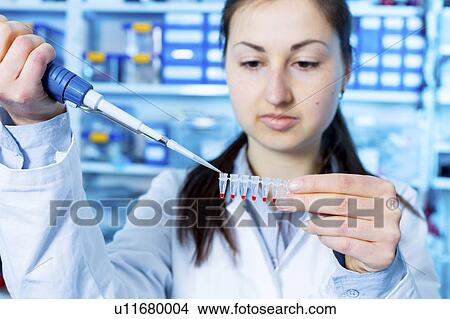 Girl using pipette View Large Photo Image Picture - Girl using pipette. Fotosearch