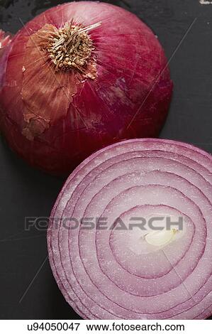 Stock Photo - Halved Red onion. Fotosearch