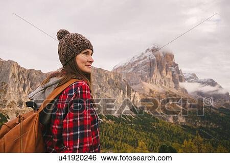 Hiker enjoying scenery, Mount Lagazuoi, Dolomite Alps, South Tyrol, Italy View Large Photo Image Stock Photograph - Hiker enjoying scenery, Mount Lagazuoi, Dolomite Alps, South Tyrol, Italy. Fotosearch